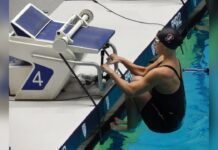 Клер Курзан прва жена под 54 секунди на 100 метри грбно Клер Курзан на старт во грбно на шампионатот Пак-12 во 2023 година